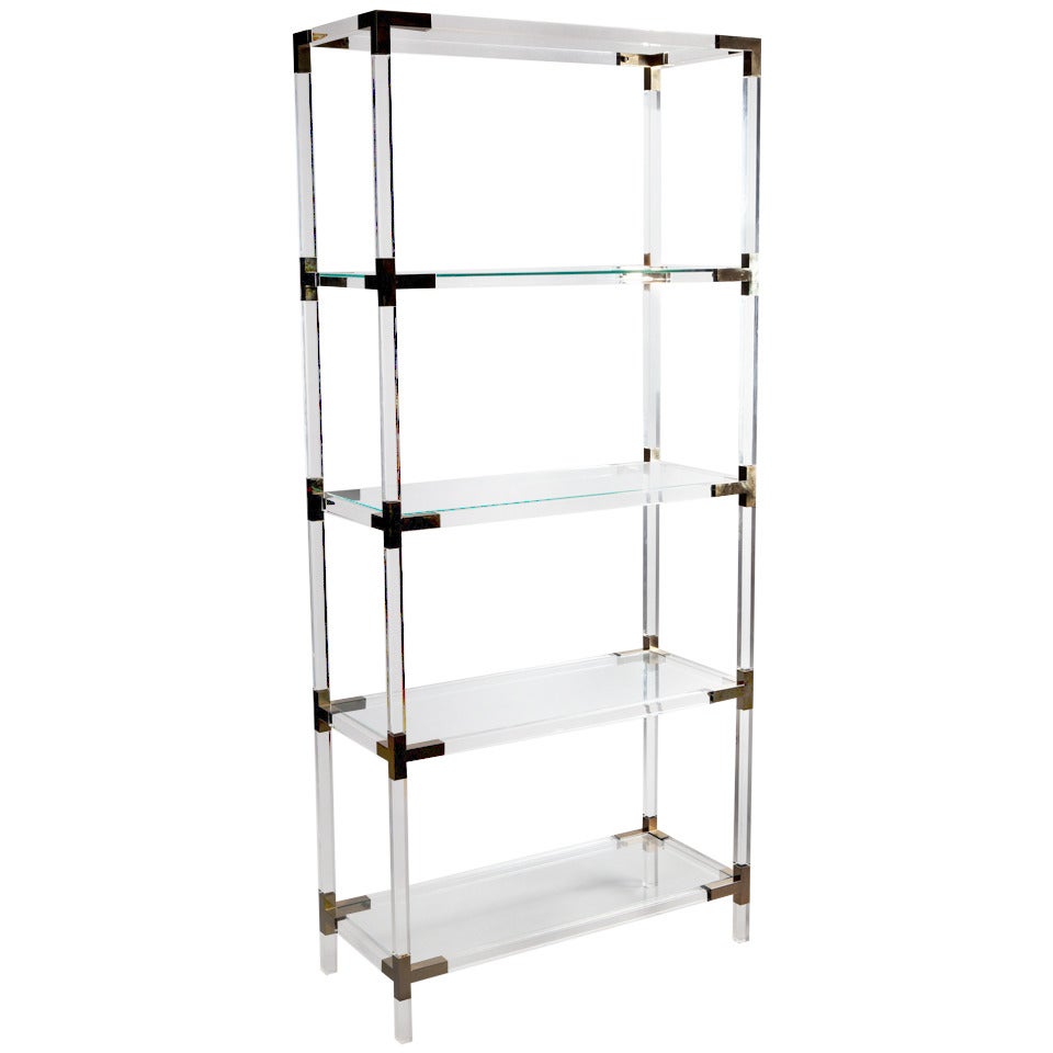 A Set of Brass Mounted Perspex Shelves