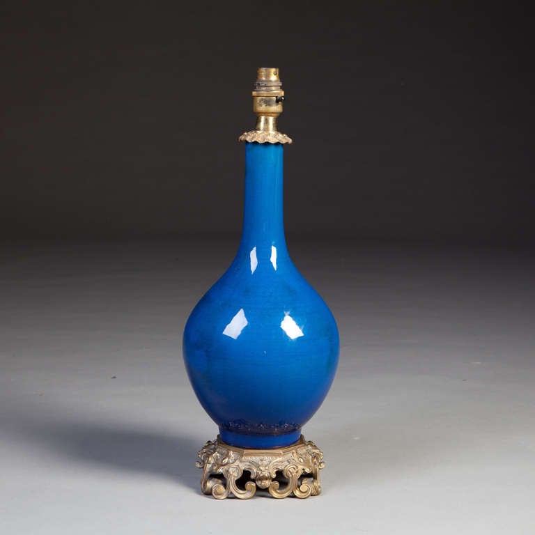 A fine mid nineteenth century blue flambe vase, now mounted with an ormolu mount.