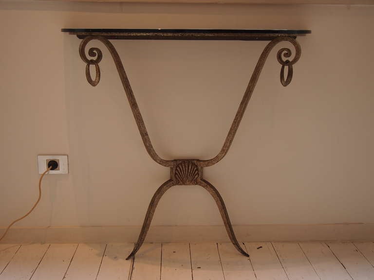 Gilt Patinated Wrought Iron Wall Console With A Black Glass Top