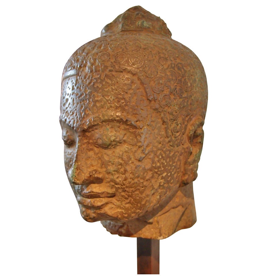 A Khmer Divinity stone head For Sale