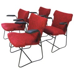 set of 4 chairs by Louis Paolozzi.