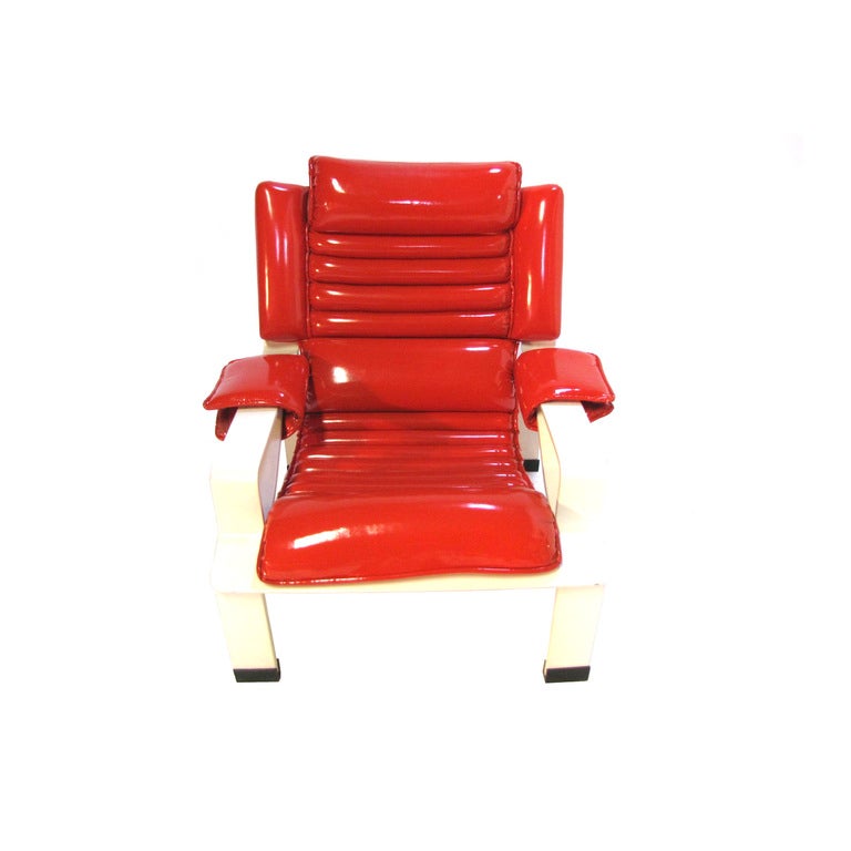 in perfect condition,lacquered plywood and red vinyl.
first edition comfort.1965
original painting and vinyl