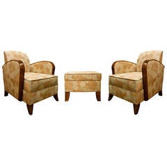 A Pair Of Art Deco Armchairs With One Footstool