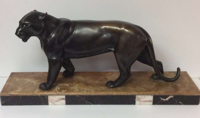 A Well sculpted Art Deco Bronze model of a Panther, by Rochard, on a Marble Base.
Signed in the Marble.
