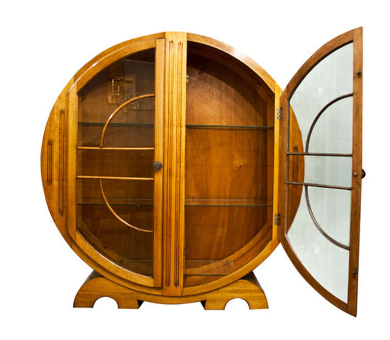 Art Deco golden oak circular display cabinet.