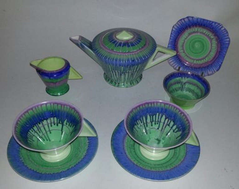 A stunning Shelley Vogue Shape Tea Set for Two in the Blue and Mauve Harmony design, Pattern # 12034/12. 

Literature:  In 1919 Eric Slater joined Shelley China, following in Walter, his father's footsteps. Taught by his father he soon took