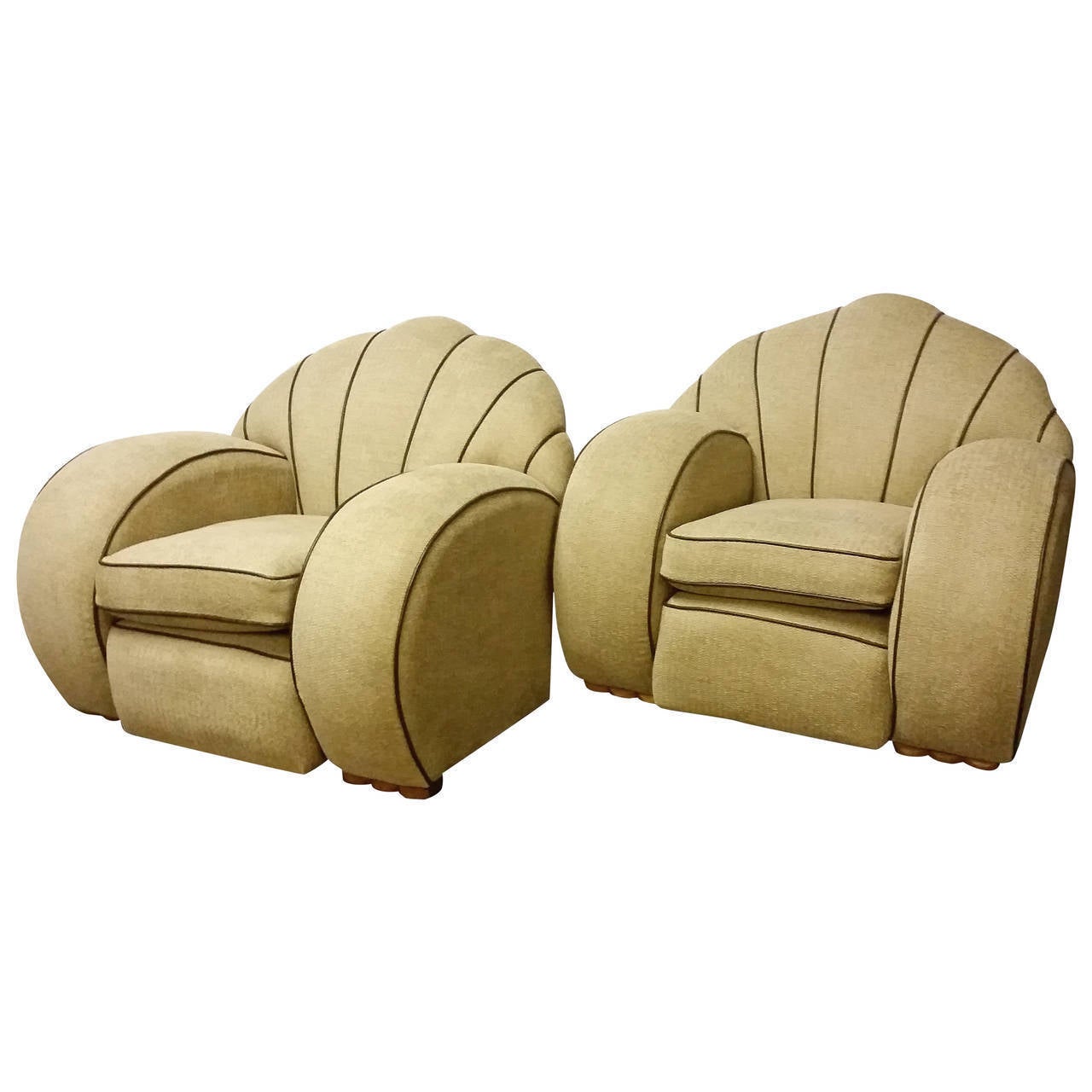 An awesome Art Deco lounge suite.
This suite comprises of one three-seat sofa and two armchairs.
We have had this fabulous suite reupholstered in a light tweed with brown leather piping and it looks marvellous.
This great shape is accentuated