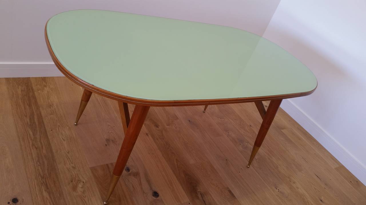Mid-20th century design dining table and six chairs.
Awesome Mid-Century Italian dining table and six chairs in beautiful cherrywood.
Elegant style to these beautifully crafted chairs, the table has an inset jade green glass top and a rope twist
