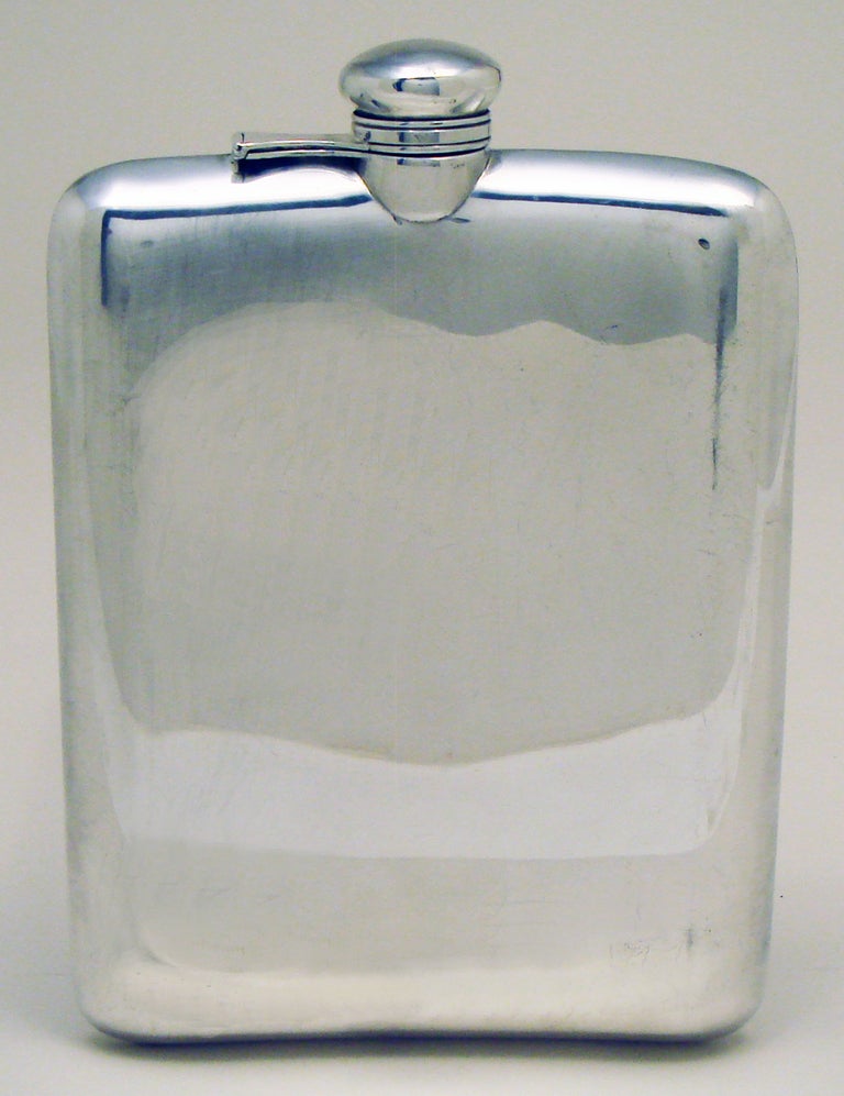 Sterling silver flask, made by Wm B. Kerr, Newark, N.J., Circa 1900.
19th Hole etching outstanding.  Holds 7/8 pint.  
Silver weight 11.5 oz.  7.25 in. tall by 5 inches wide by 1 inch thick.