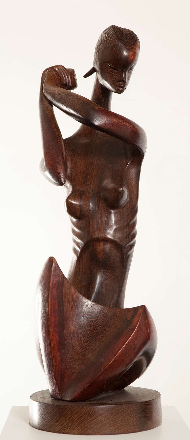 Very elegant sculpture in tropical wood influenced by some  other great 
European artists.