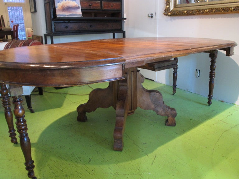 Oval Pedestal Dining Table with 2 Large Finished Extension Leaves at