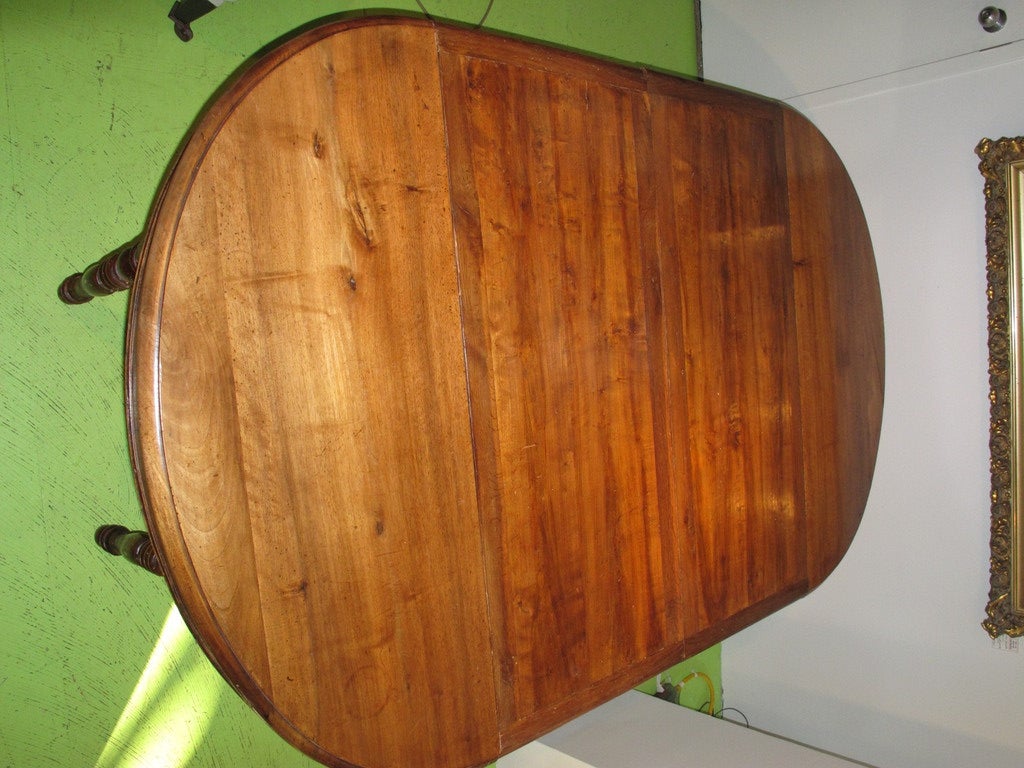 Oval Pedestal Dining Table with 2 Large Finished Extension Leaves at