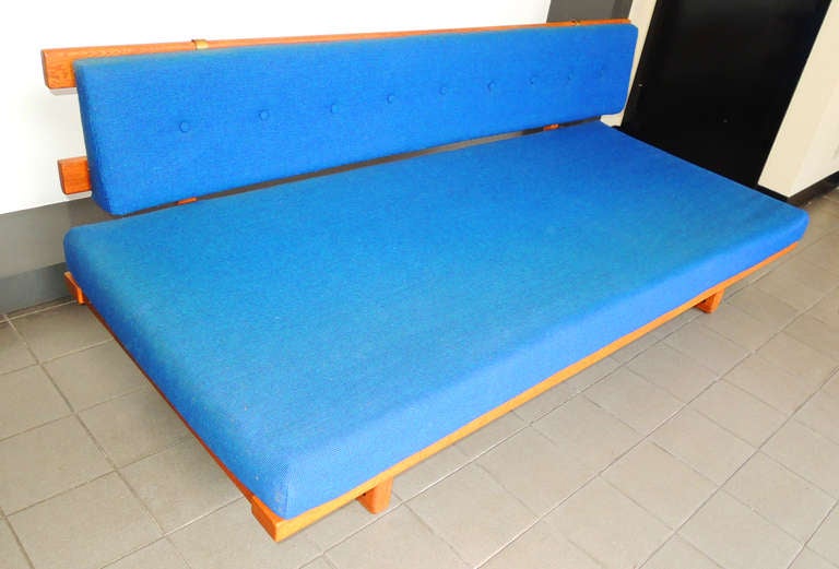 Danish day bed designed by Borge Mogensen for Fredericia, 
c. 1950. Mogensen was a master of scientific functionality, marrying a scientific analysis of the utility of a piece of furniture with clean, aesthetic lines. The day bed is in original