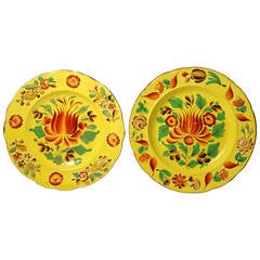 Two Canary Yellow Pottery Plates with Bright Enamels, Probably Staffordshire