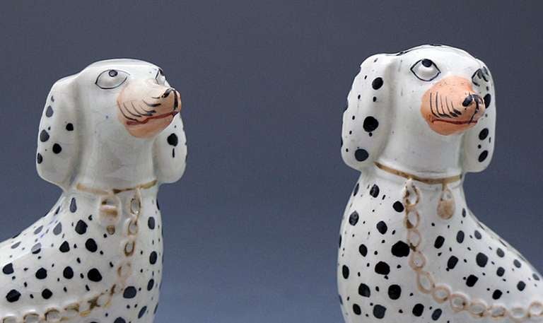 Pair of Antique Staffordshire Figures of Dalmatian Dogs Seated on Blue Bases circa 1855 Period In Excellent Condition For Sale In Woodstock, OXFORDSHIRE