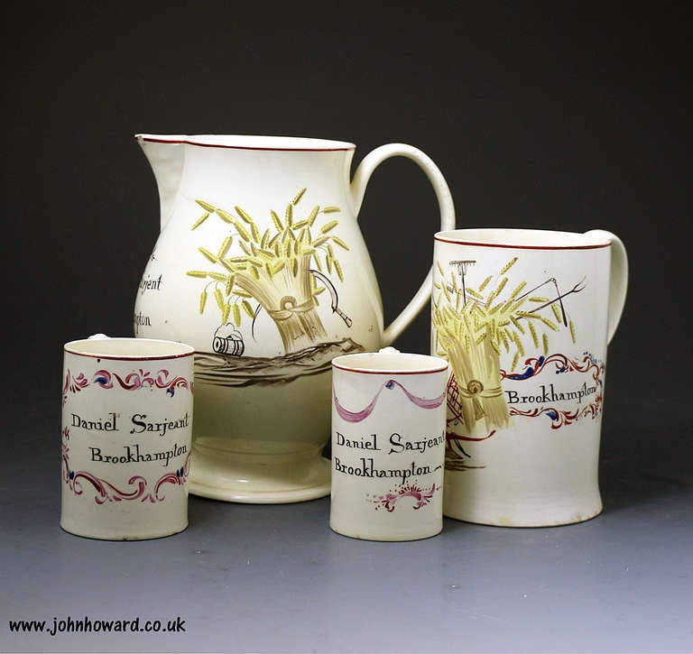 Group of English Creamware Pottery Tankards and Pitchers Named and