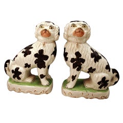 Pair Victorian period Staffordshire pottery pipe smoking dogs 