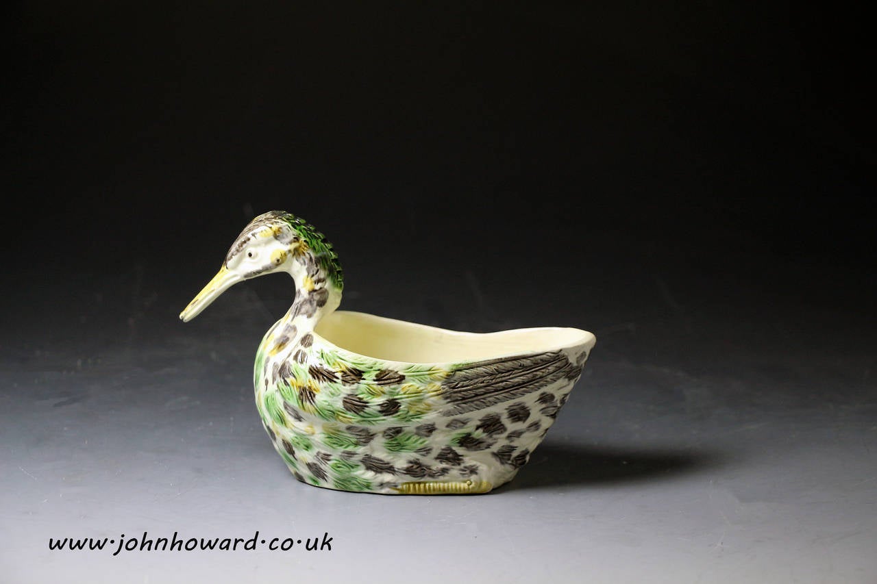 A good example of a Staffordshire duck shaped sauce boat. 
This piece is an early example with fine coloured glaze and very crisp modelling.