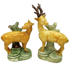 Stag and doe Prattware figures with bocage