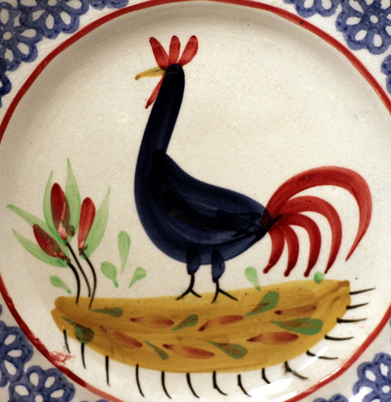 Classic Llanelly pottery cockerel plate stick sponge decorated by Sarah Roberts also known affectionally as Aunt Sal.
The cockerel plate is perhaps the most famous decorated ware associated with the Llanelly Pottery. Interestingly it has been