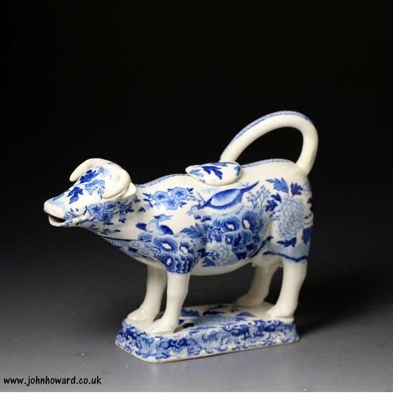 blue and white cow creamer