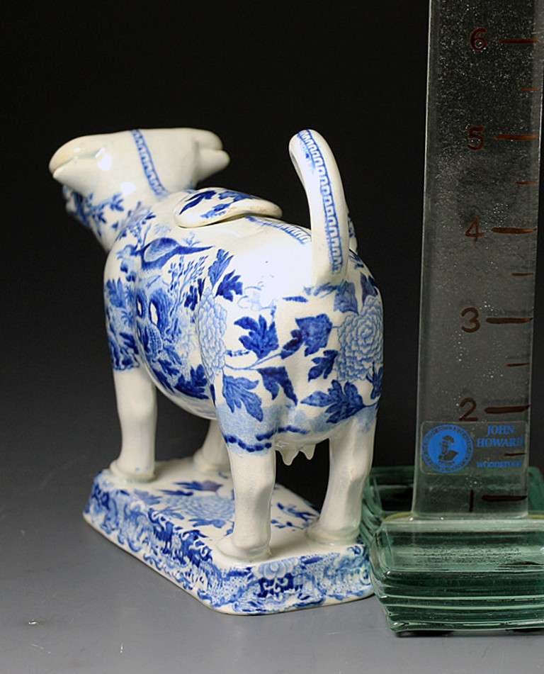 English Antique Staffordshire or Yorkshire Pottery Cow Creamer in Underglaze Blue and White Transfer circa 1820