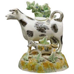 Antique English Pottery Cow Creamer with Bocage Late 18th Century