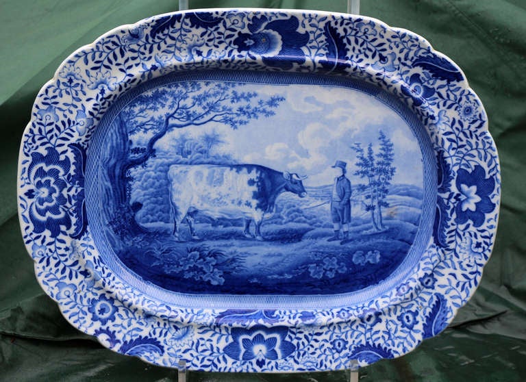 A rare and fine example of a large blue and white underglaze transfer decorated pottery platter in the famous Durham Ox pattern.
The Durham Ox platter is one of the rarest patterns in underglaze blue and white and is one of the most desirable