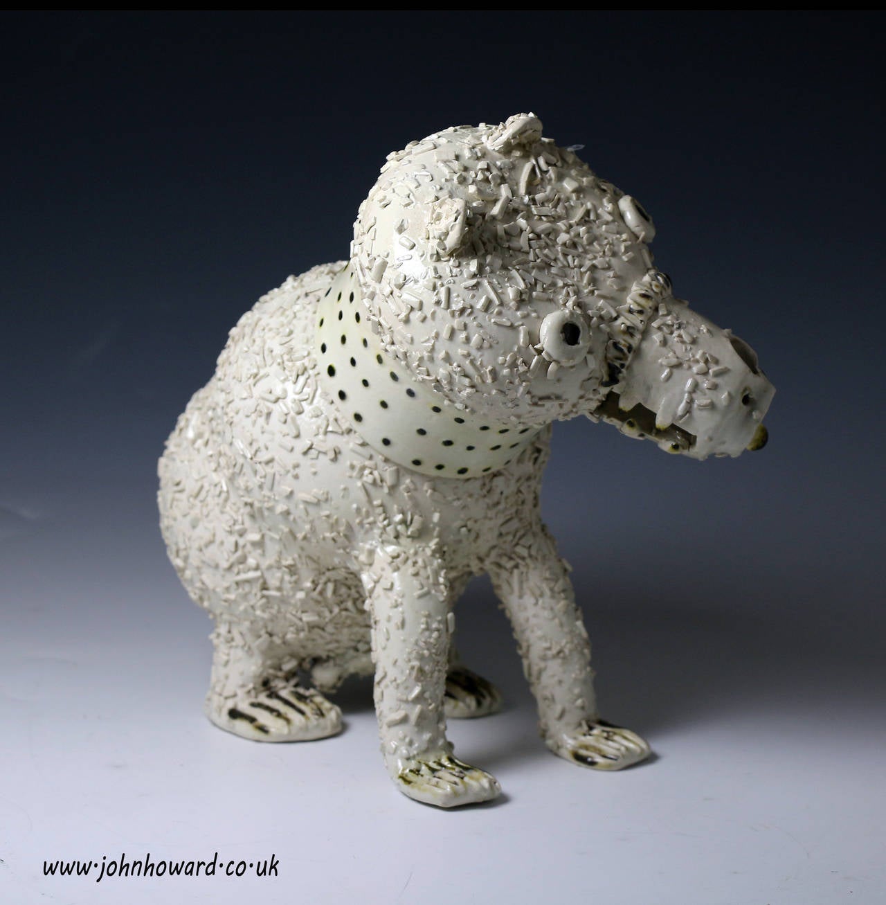 Antique Staffordshire stoneware saltglaze bear jug from the mid 18th century period. 
The figure is naively modelled and decorated with shredding representing the fur. 

Pure artistic form has a timeliness quality and this figure would take its