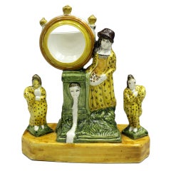 Antique English pottery watch holder flanked by two figures, Prattware c1800 