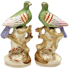 Pair antique Victorian Staffordshire pottery figures of exotic birds