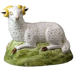 Antique pottery figure of a ram in Pratt Ware colours, English Yorkshire or Staffordshire pottery.