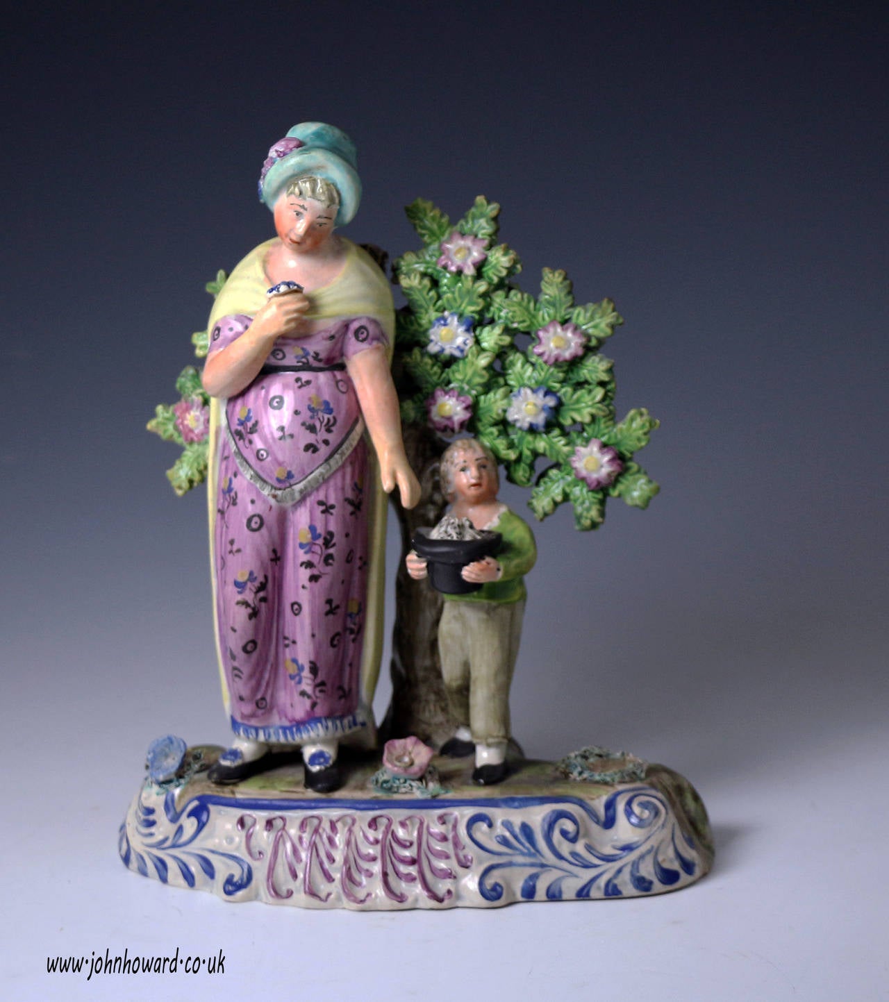 Staffordshire Pottery Pearlware "Seasons" Figure with Bocage