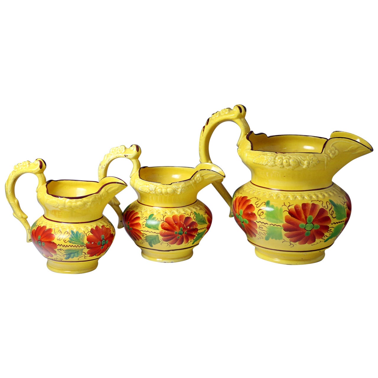 Set of Three Antique Staffordshire Pottery Canary-Yellow Pitchers