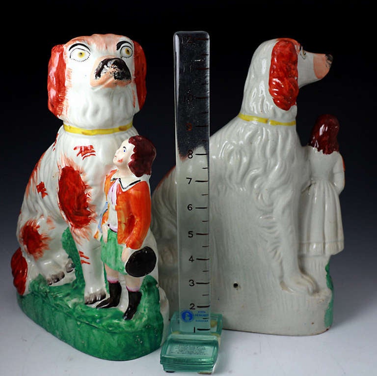 English Pair of antique Staffordshire Pottery Victorian Afghan dogs with children 