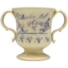 Scratch blue saltglaze pottery loving cup named and dated 1765 