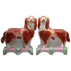Antique Staffordshire Figures of Spaniels Standing on Pink and Green Bases known as Grace and Majesty circa 1855