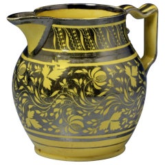 Canary yellow ground pitcher with silver resist decoration c1820 