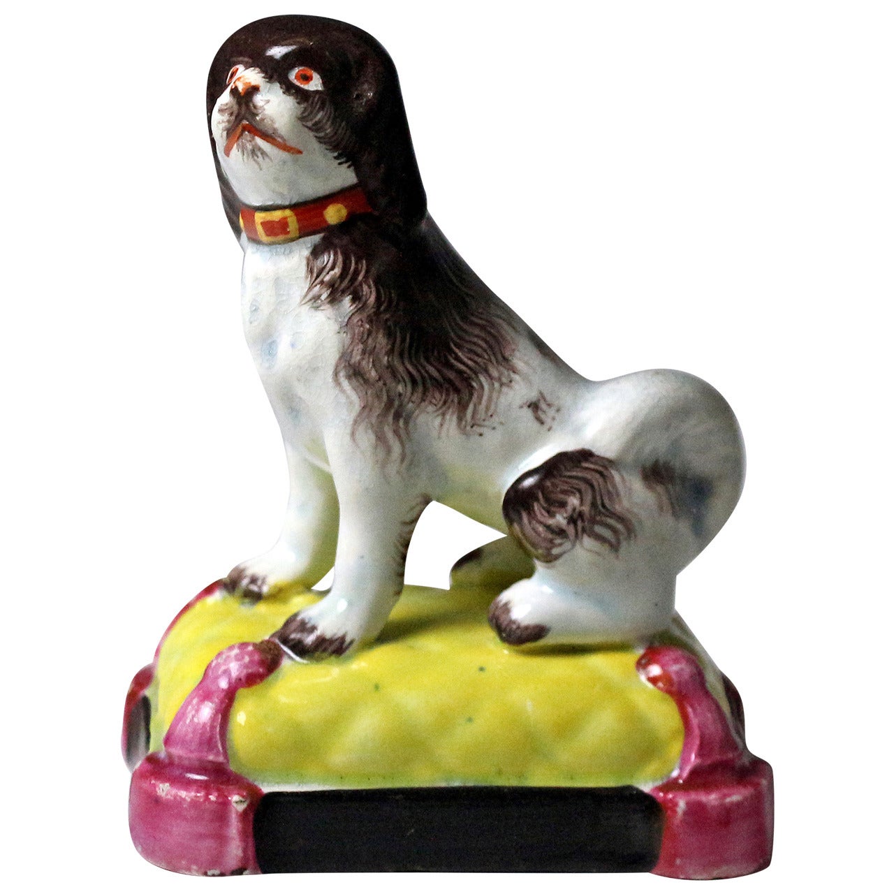 Staffordshire Pottery Pearlware Figure of a Dog Seated on Cushion Base