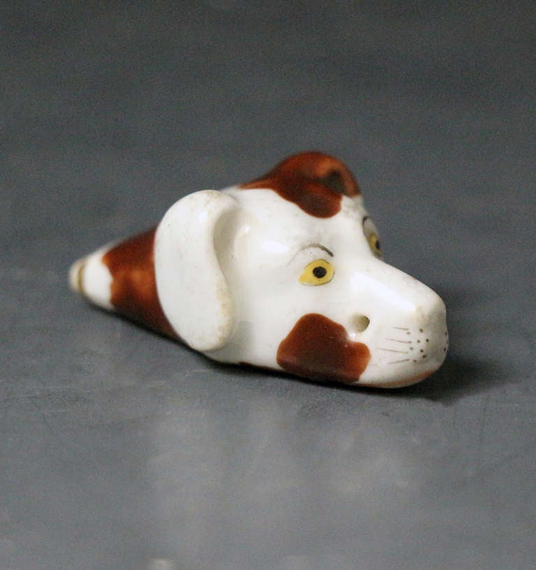 Hound head dog whistle probably from the Derby Porcelain workshops.
Gives a high pitch whistle!