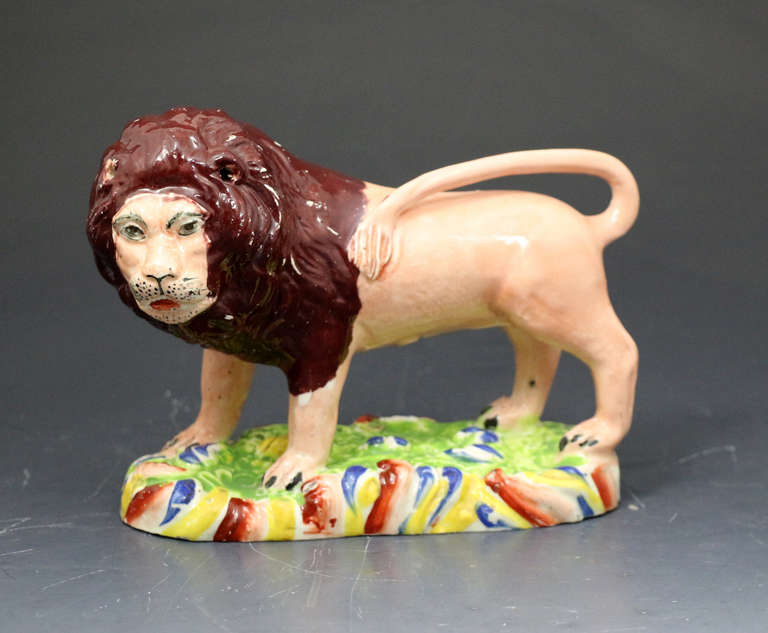 Antique Staffordshire pottery pearlware figure of lion circa 1830