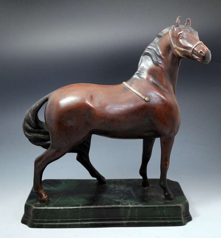 A very rare and imposing Leeds Pottery Horse modeled standing on an oblong base. 
The figure dates to circa 1810-20 period. Historically it is summized that these large figures were intended to be used as an advertising medium in Saddlers and Tack