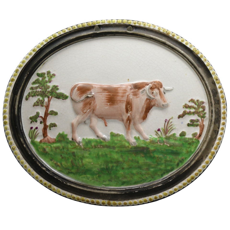 Antique Staffordshire pottery oval plaque with figure of a bull