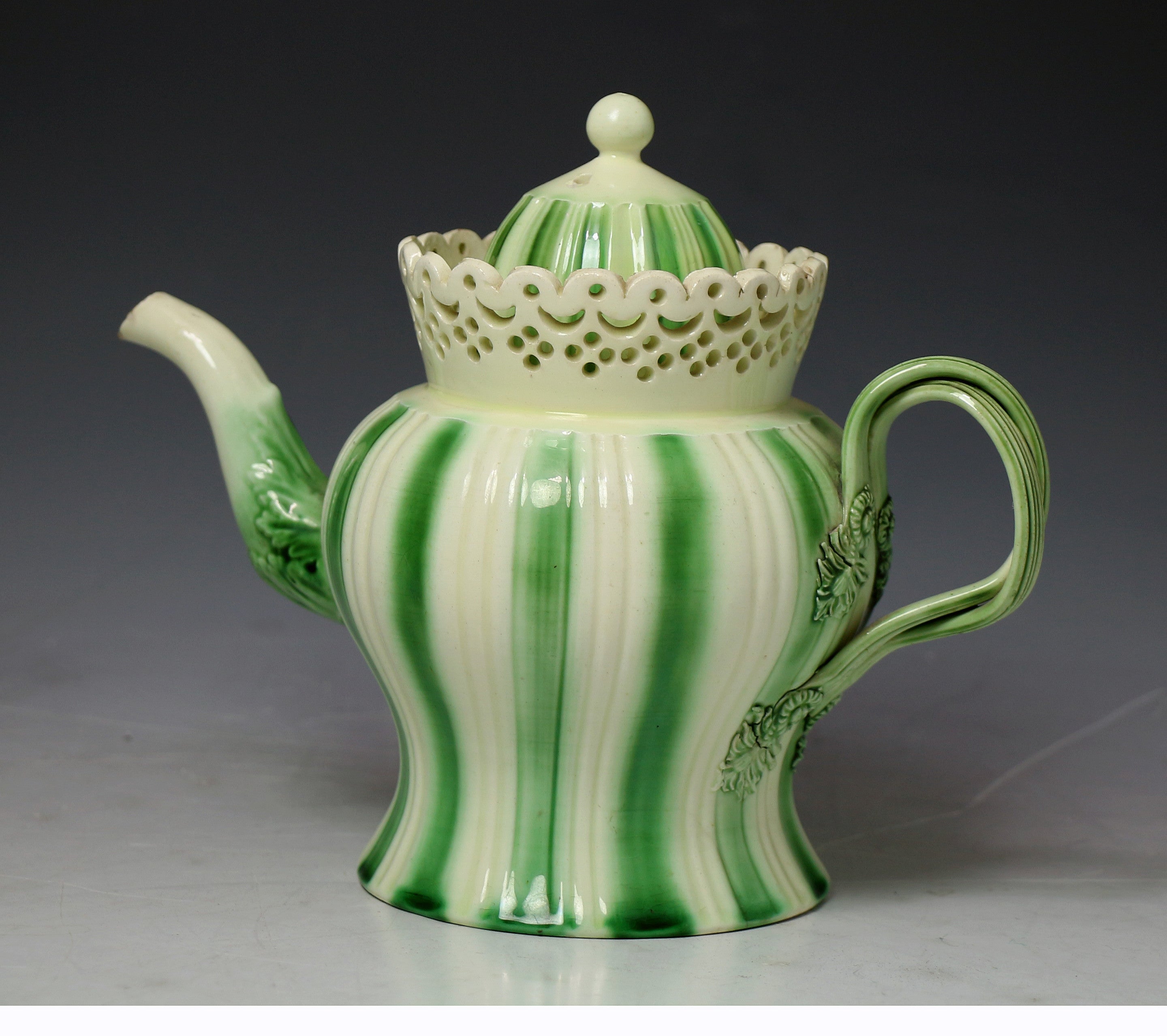 Antique English period creamware pottery teapot with reticulation & green border