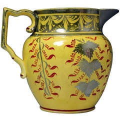 English pottery antique pitcher with canary yellow ground