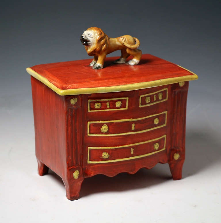 Antique Staffordshire pottery box with cover the finial the figure of a lion
