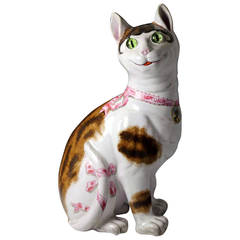 Antique Pottery Figure of a Cat with Glass Eyes