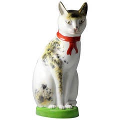 Antique Staffordshire Pottery Figure of a Seated Cat with a Knowing Smile