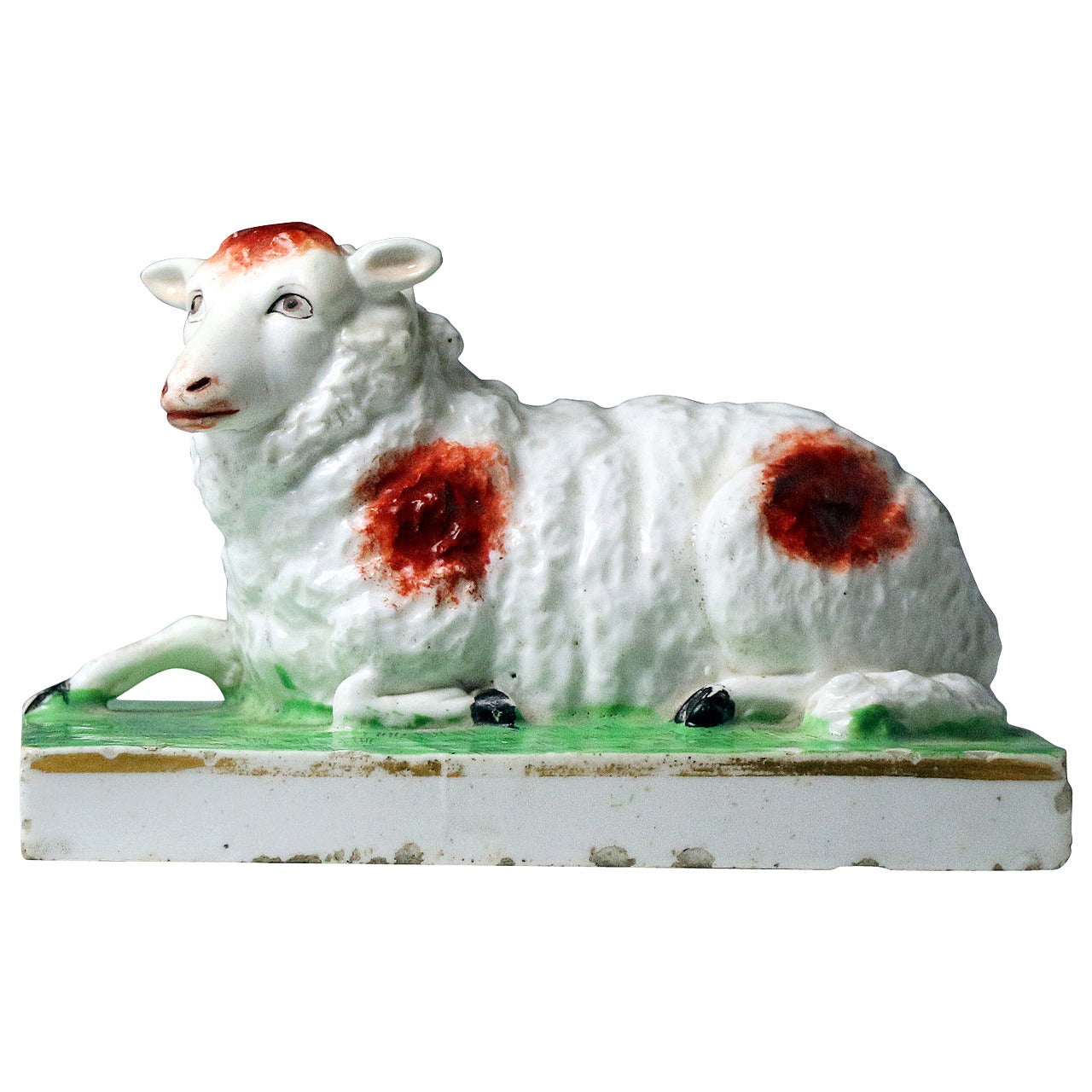 Antique English Porcelain Figure of a Recumbent Sheep on an Oblong Base