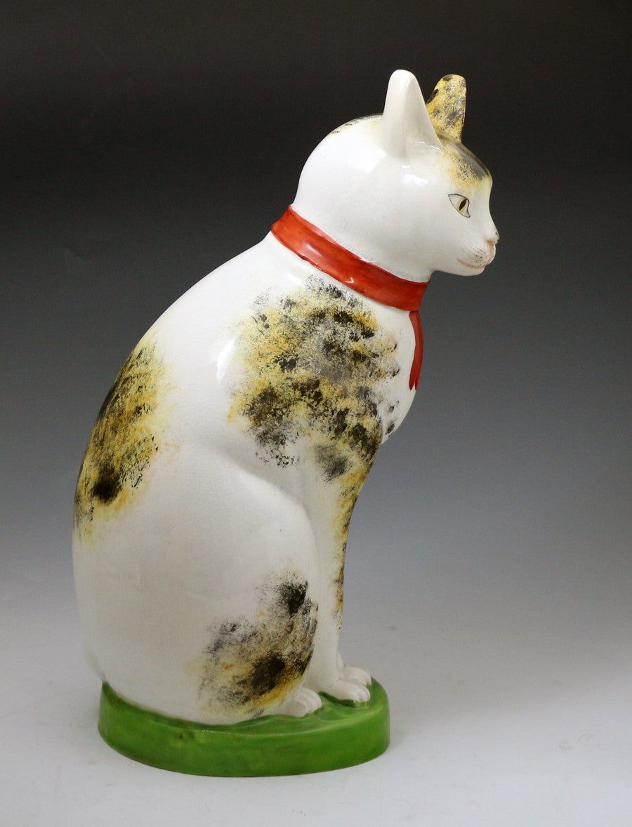 English Staffordshire Pottery Figure of a Seated Cat with a Knowing Smile